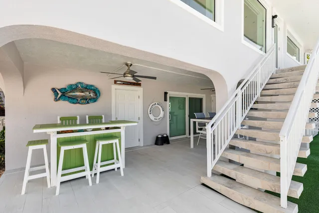 a view of a house with outdoor seating area