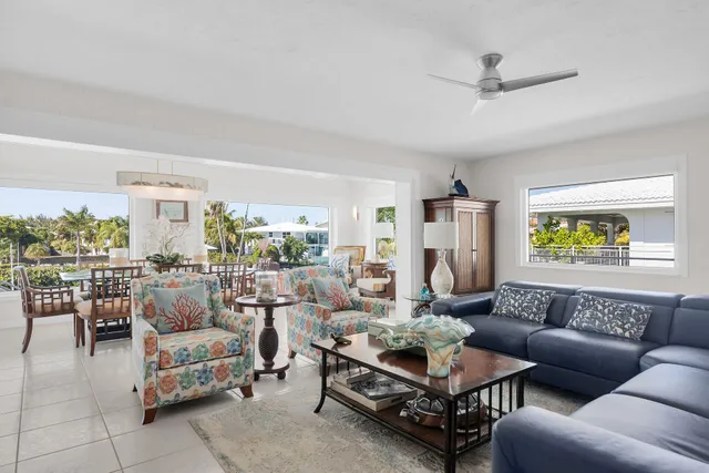 a living room with furniture and a table