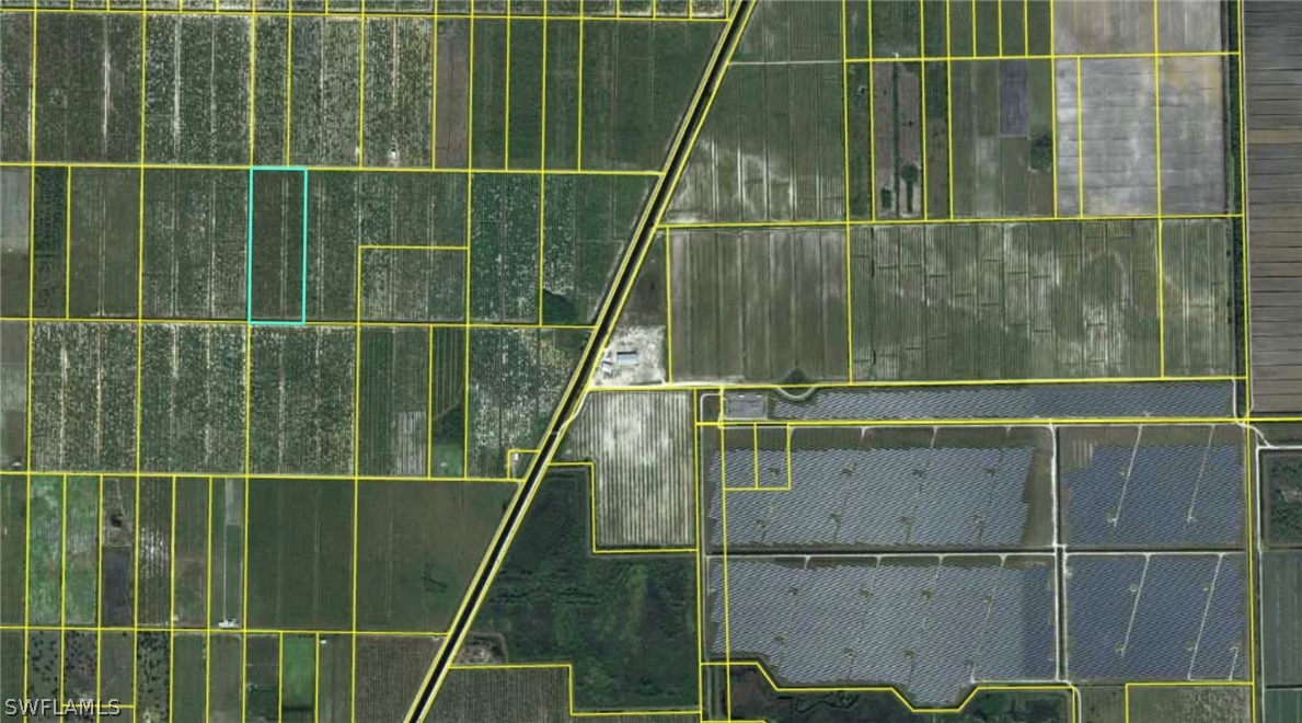 6-th Sears Road LaBelle, FL 33935 - Photo 4 of 5 a bathroom with a shower and a sink