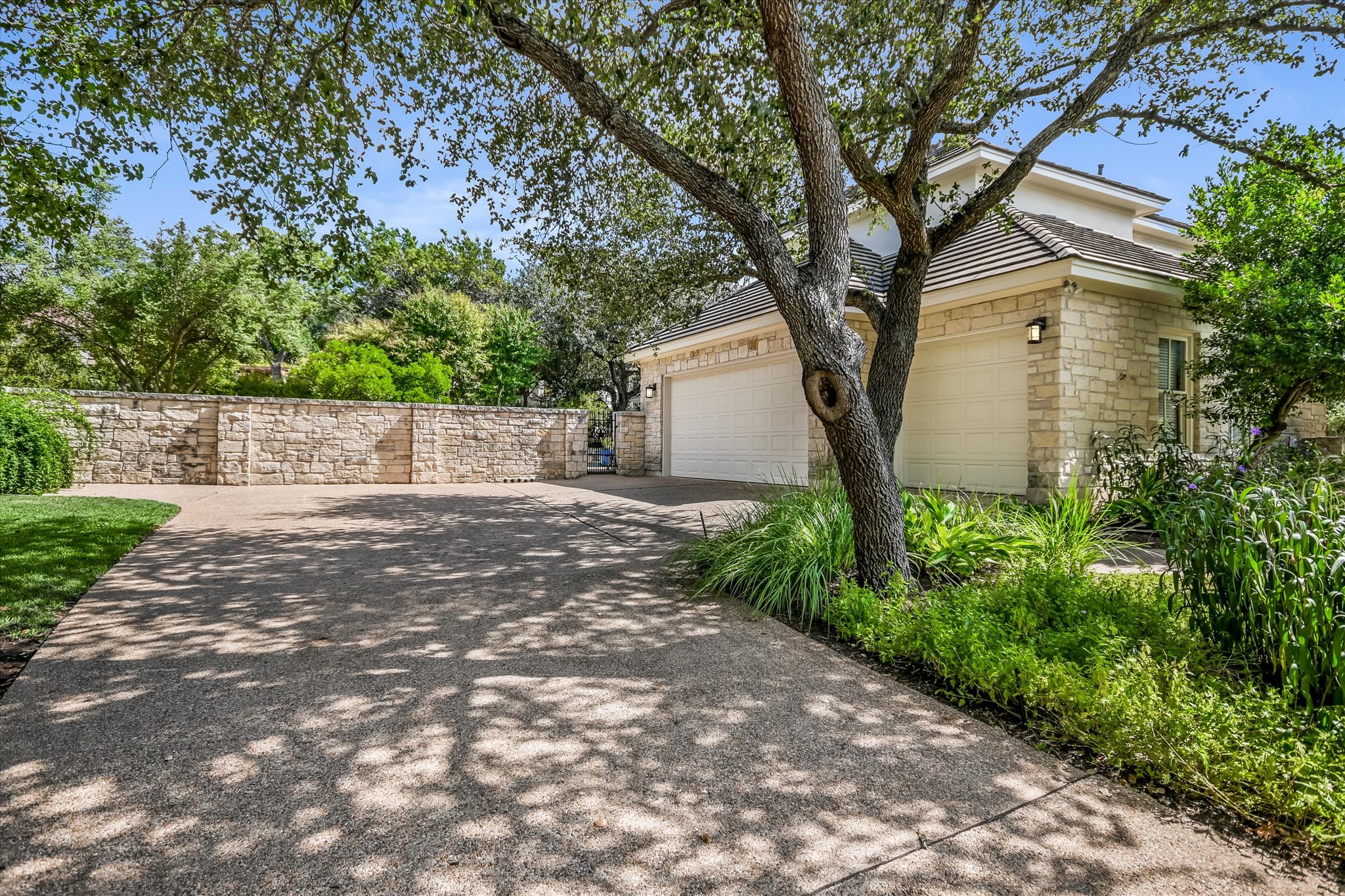 2901 Maravillas Loop Austin, TX 78735 - Photo 30 of 31 a front view of a house with garden