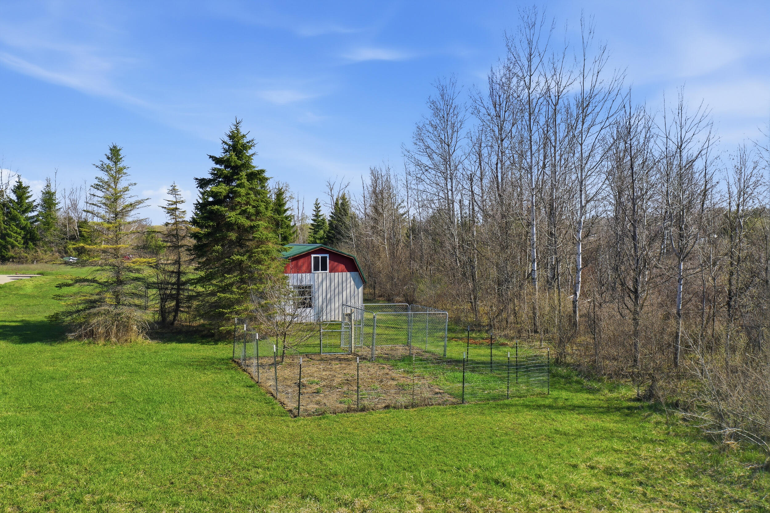 4087 4 Mile Road Sears, MI 49679 - Photo 16 of 39 Fenced In Garden Area