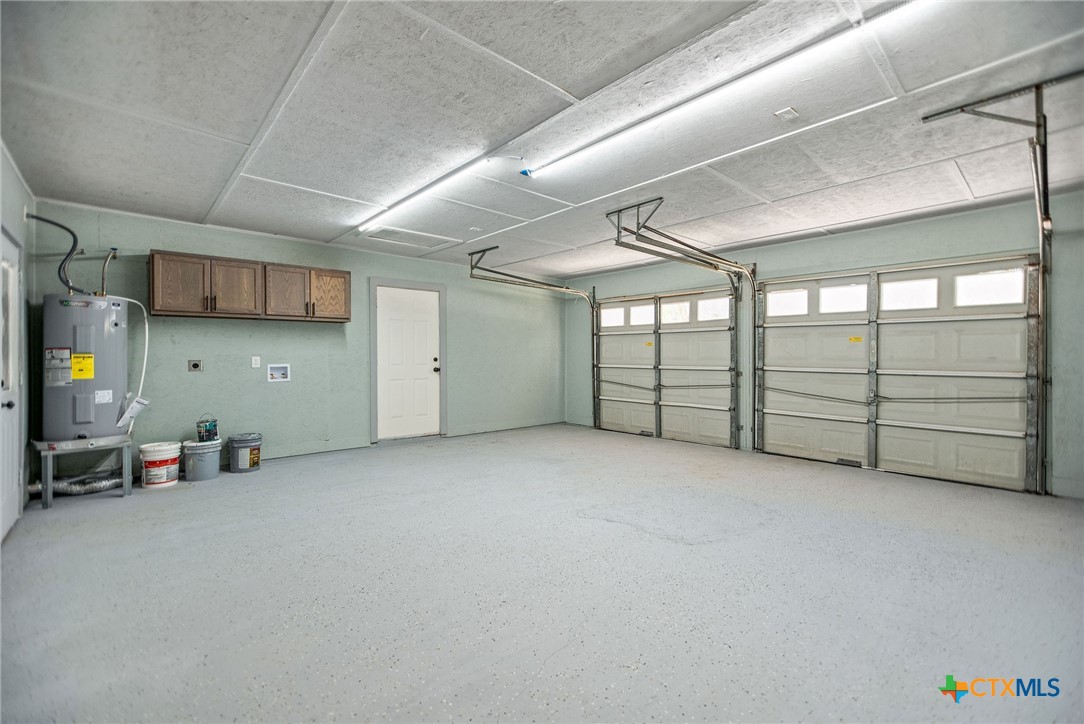 210 Travis Street Port Lavaca, TX 77979 - Photo 25 of 28 2 car garage with epoxy flooring.
