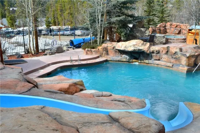 a room with furniture and a flat screen tv