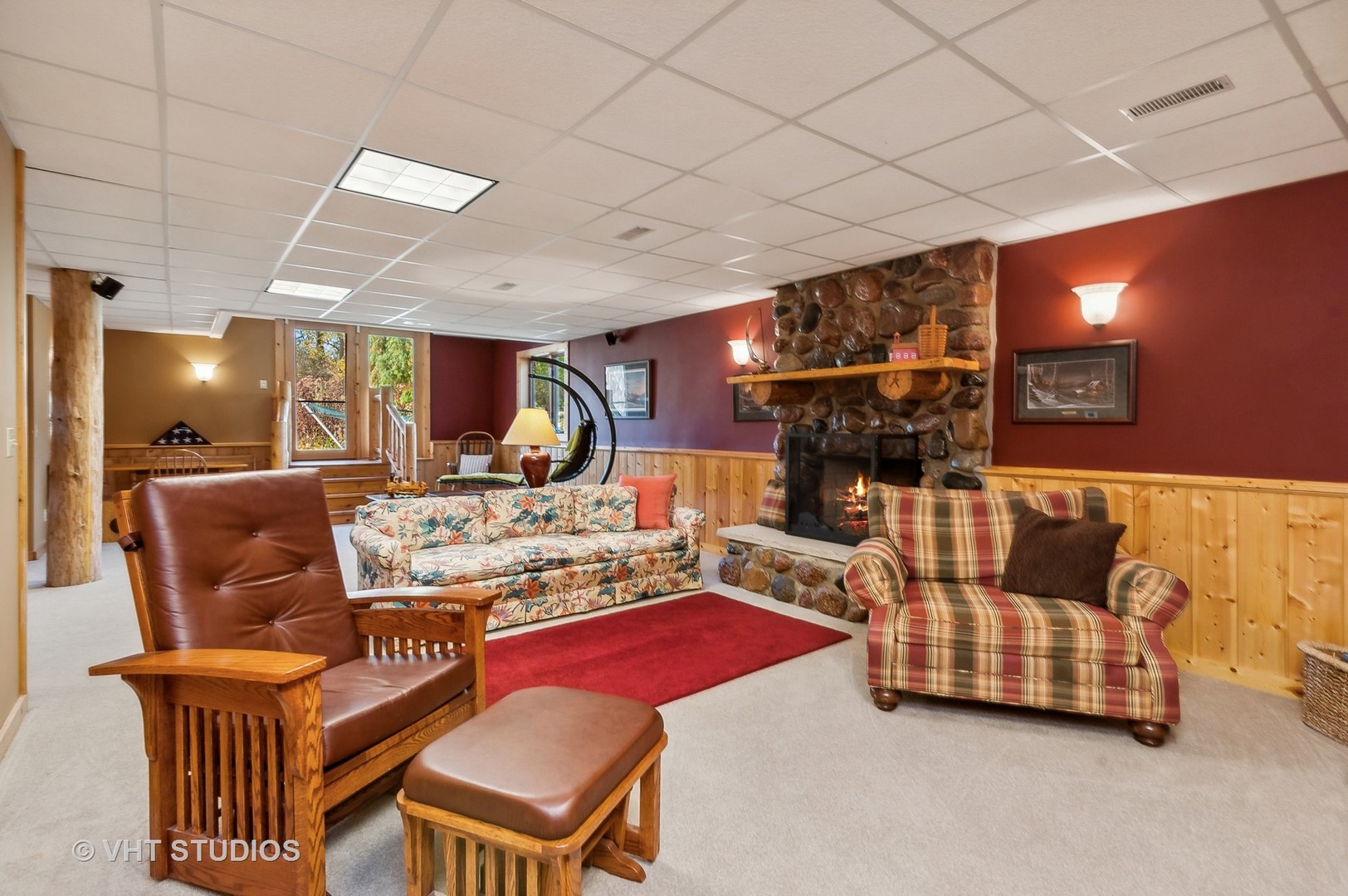 2317 Paulson Road Harvard, IL 60033 - Photo 18 of 37 a living room with furniture a ceiling fan and a fireplace