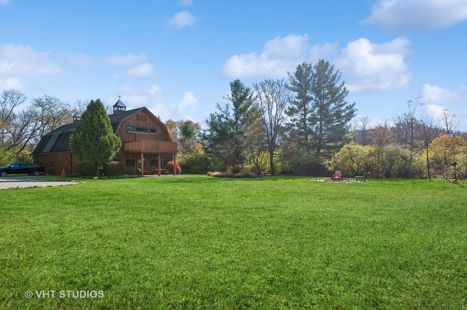 2317 Paulson Road Harvard, IL 60033 - Photo 23 of 37 a view of a garden with large trees