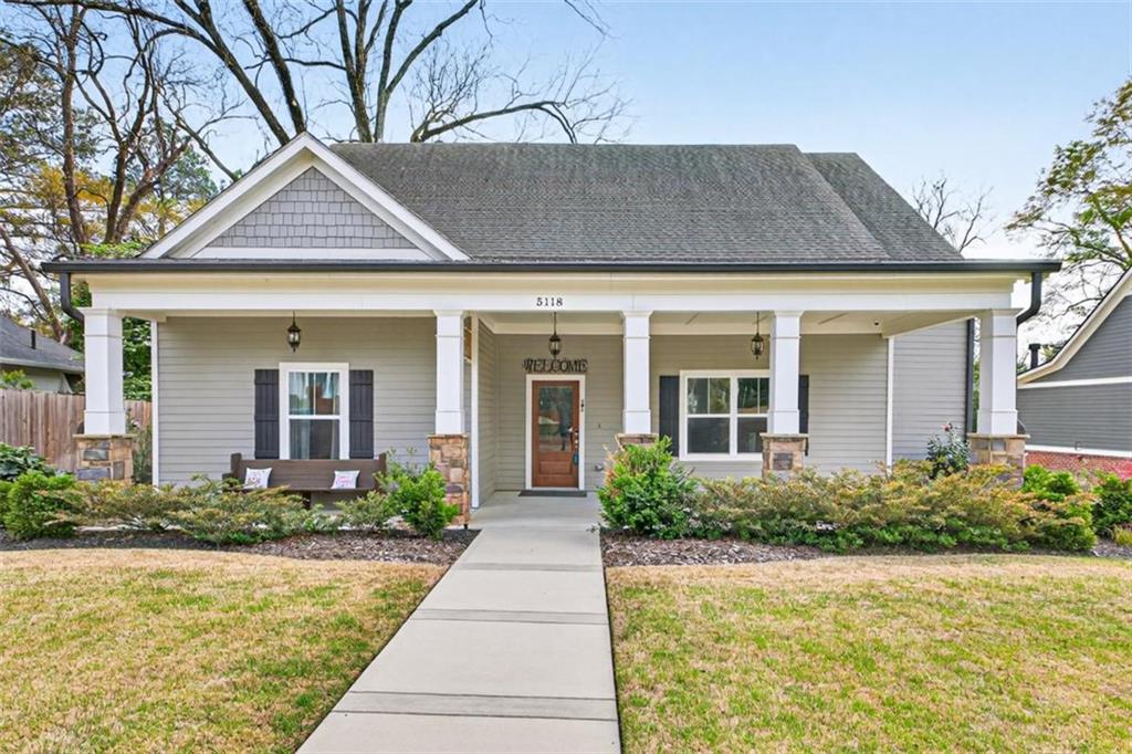 5118 Floyd Street Northeast Covington, GA 30014 - Photo 1 of 78 front view of a house with a yard