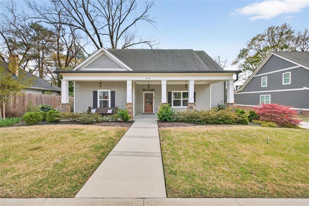 5118 Floyd Street Northeast Covington, GA 30014 - Photo 2 of 78 front view of a house with a yard