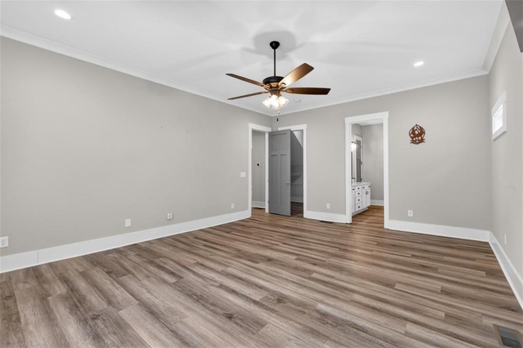 5118 Floyd Street Northeast Covington, GA 30014 - Photo 29 of 78 a view of an empty room with wooden floor