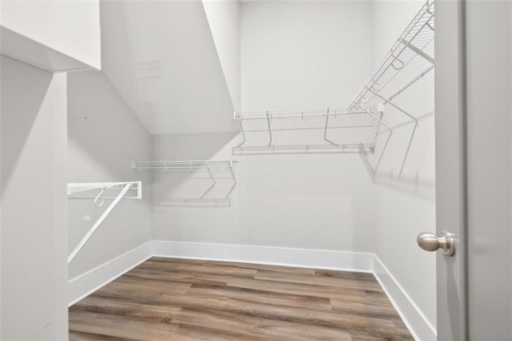 5118 Floyd Street Northeast Covington, GA 30014 - Photo 34 of 78 a view of a room with racks on the wall