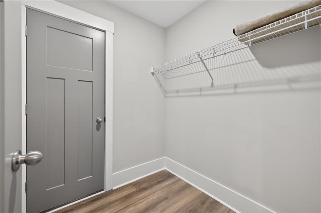 5118 Floyd Street Northeast Covington, GA 30014 - Photo 50 of 78 a view of a room with racks on the wall
