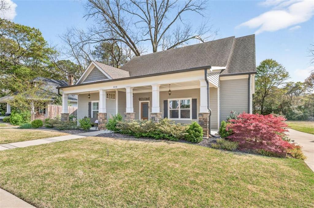 5118 Floyd Street Northeast Covington, GA 30014 - Photo 5 of 78 a front view of house with yard and green space