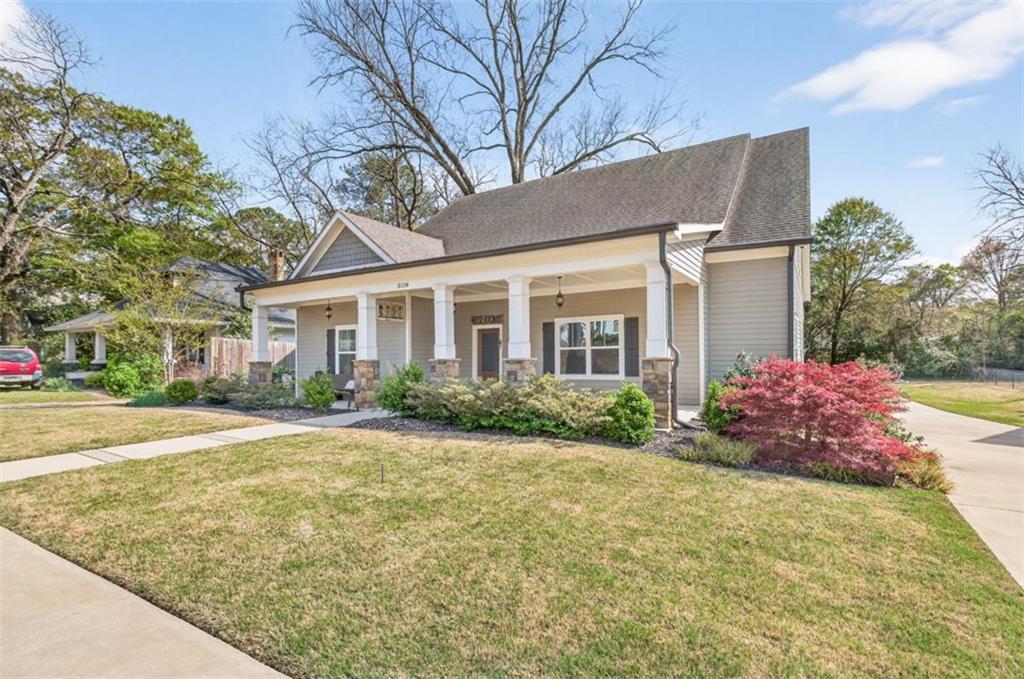 5118 Floyd Street Northeast Covington, GA 30014 - Photo 6 of 78 a front view of house with yard and trees around