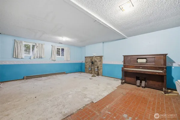 a bedroom with a bed and a desk