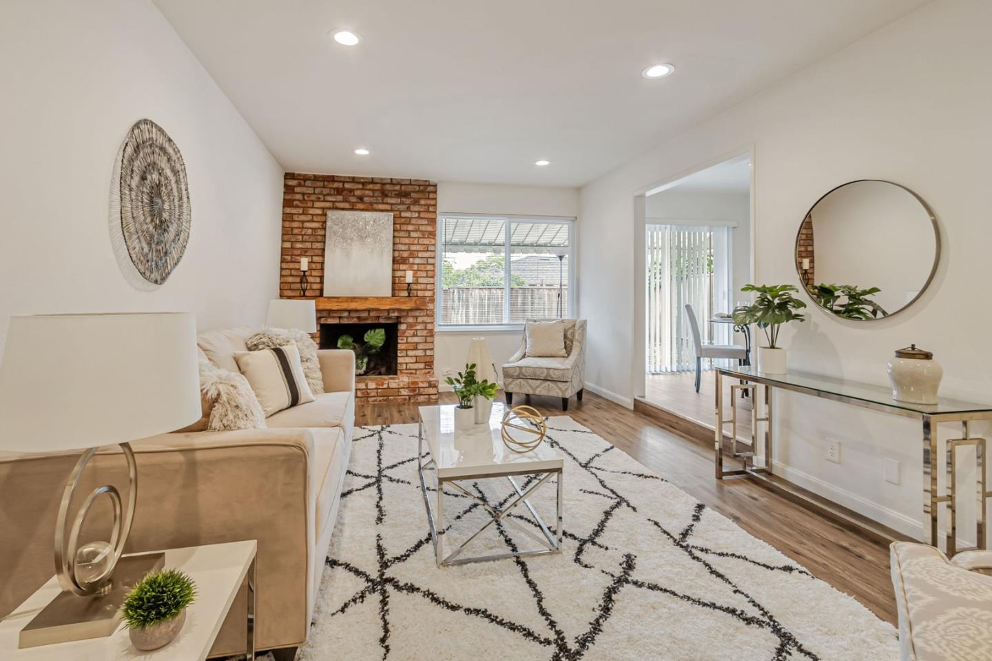844-846 Doyle Road San Jose, CA 95129 - Photo 5 of 38 a living room with furniture and a large window