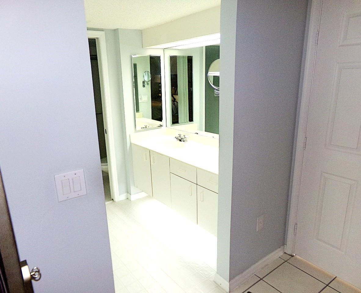 9563 Weldon Circle, Unit D110 Tamarac, FL 33321 - Photo 16 of 37 master bedroom