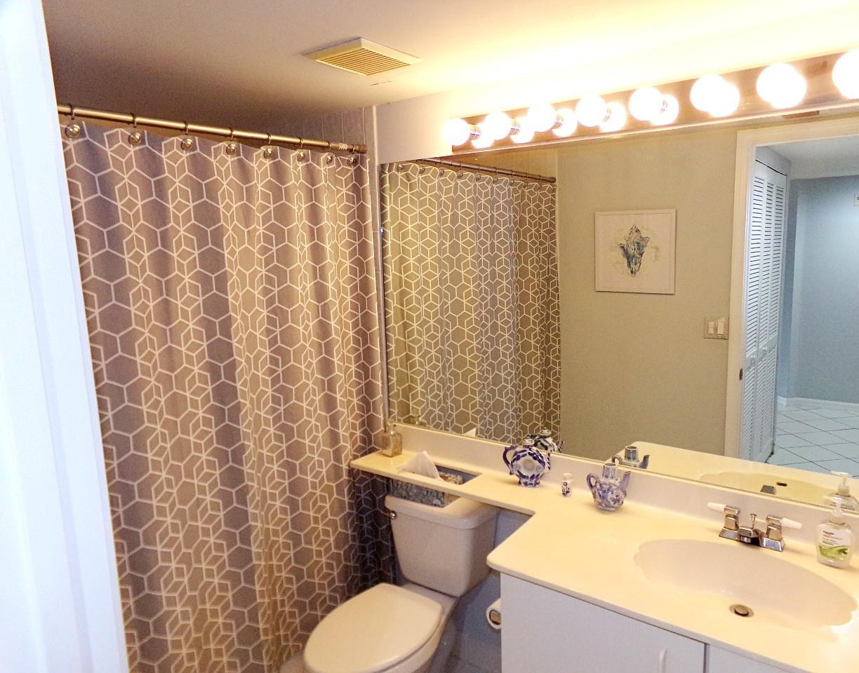 9563 Weldon Circle, Unit D110 Tamarac, FL 33321 - Photo 21 of 37 2nd bathroom