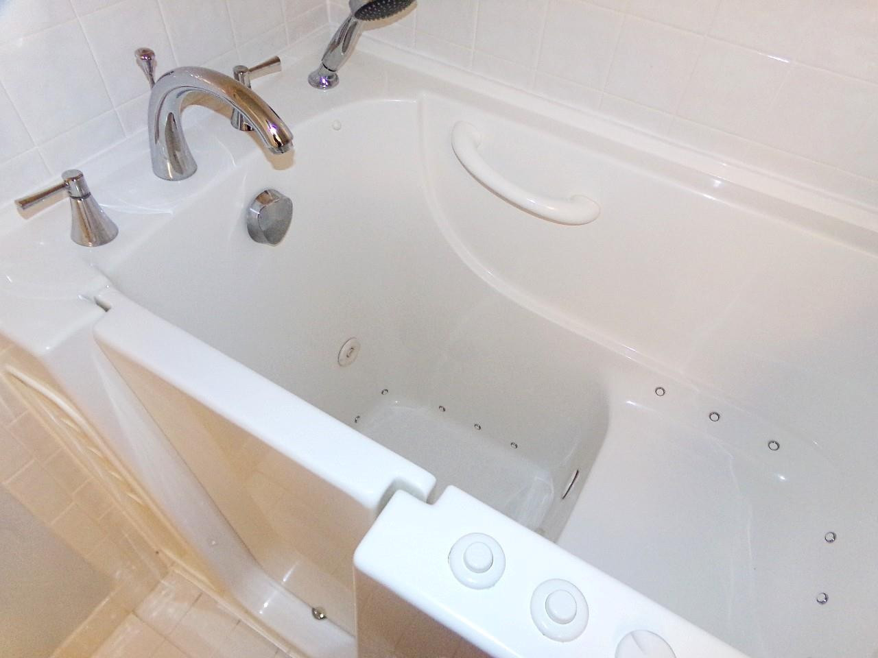 9563 Weldon Circle, Unit D110 Tamarac, FL 33321 - Photo 22 of 37 2nd bathroom