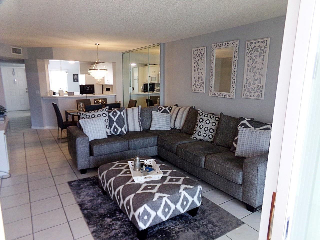 9563 Weldon Circle, Unit D110 Tamarac, FL 33321 - Photo 9 of 37 living room