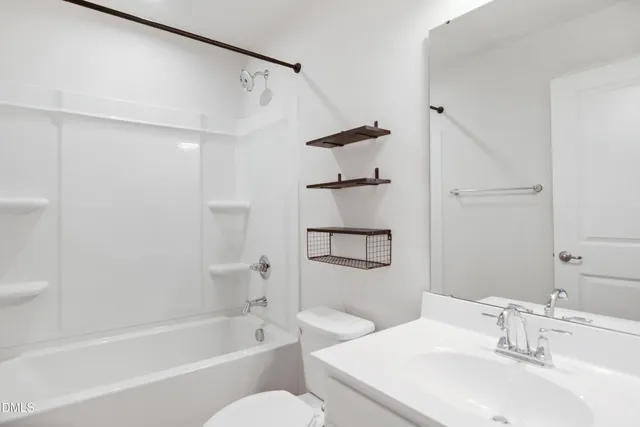 a view of a balcony with wooden floor