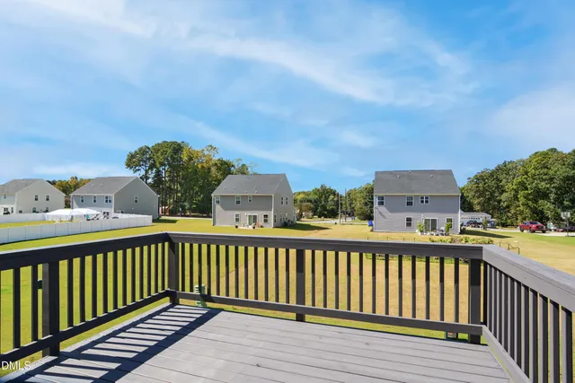 a view of an chairs in the balcony