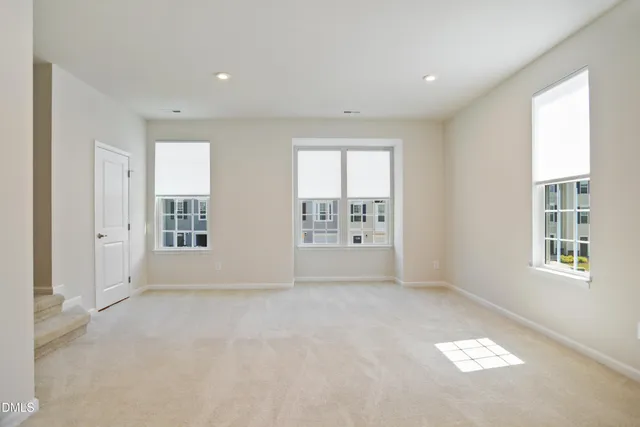 a view of entryway and livingroom with furniture