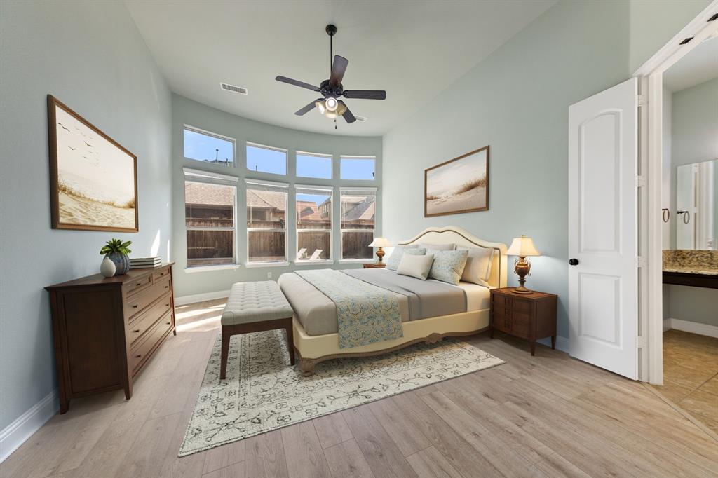 8336 Pitkin Road Frisco, TX 75036 - Photo 22 of 40 a bedroom with bed and a large window