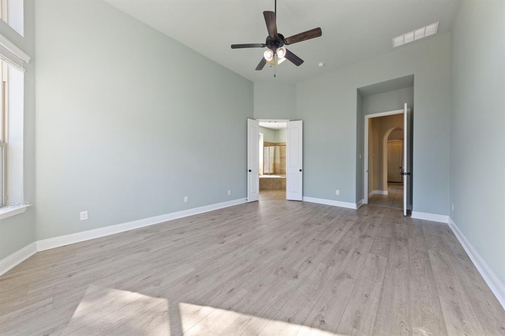 8336 Pitkin Road Frisco, TX 75036 - Photo 23 of 40 a view of empty room with wooden floor