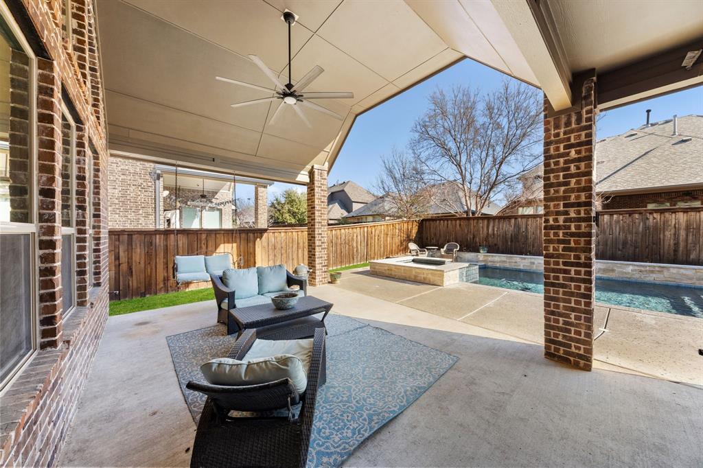 8336 Pitkin Road Frisco, TX 75036 - Photo 37 of 40 a living room with furniture and a large window