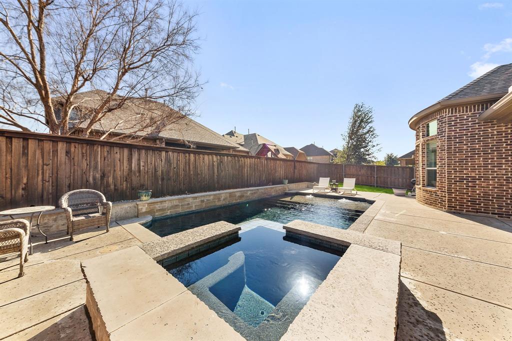 8336 Pitkin Road Frisco, TX 75036 - Photo 38 of 40 a view of a patio with couches chairs and wooden fence