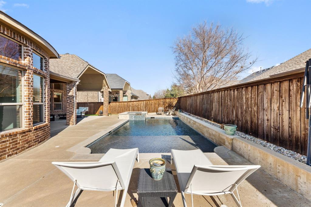 8336 Pitkin Road Frisco, TX 75036 - Photo 40 of 40 a picture of table and chairs with wooden fence