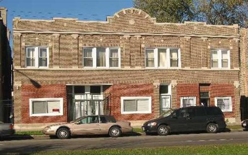 4248 West Cermak Road Chicago, IL 60623 - Photo 1 of 1 a car parked in front of a building