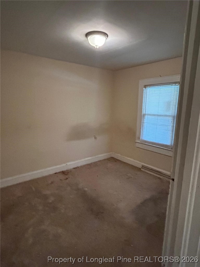 10199 Aberdeen Road Aberdeen, NC 28315 - Photo 18 of 44 an empty room with a window