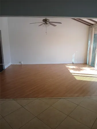 a view of a livingroom with wooden floor