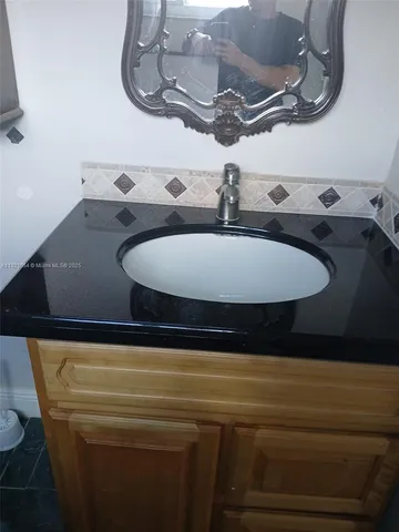 an empty room with a wooden door