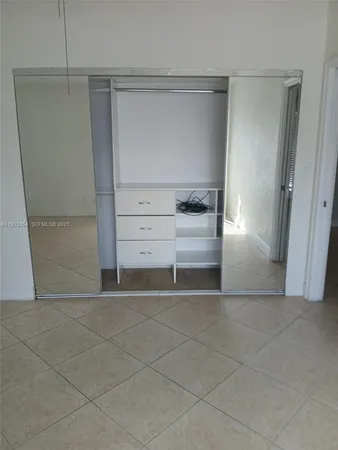 a view of a refrigerator and window
