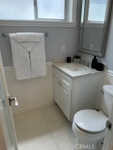 a bathroom with a toilet and a sink