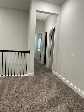 a view of hallway with stairs