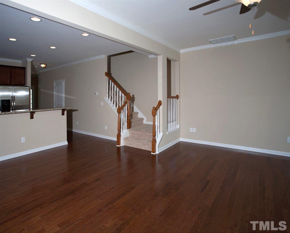 213 Irving Way, Unit 69 Durham, NC 27703 - Photo 9 of 25 a view of a livingroom with wooden floor