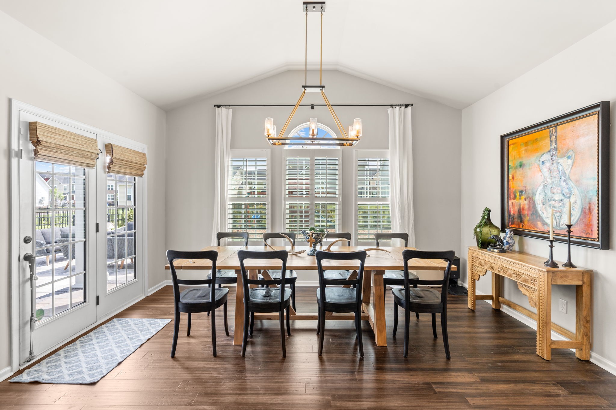 6050 Huntmere Avenue Franklin, TN 37064 - Photo 12 of 38 a view of a dining room with furniture window and wooden floor