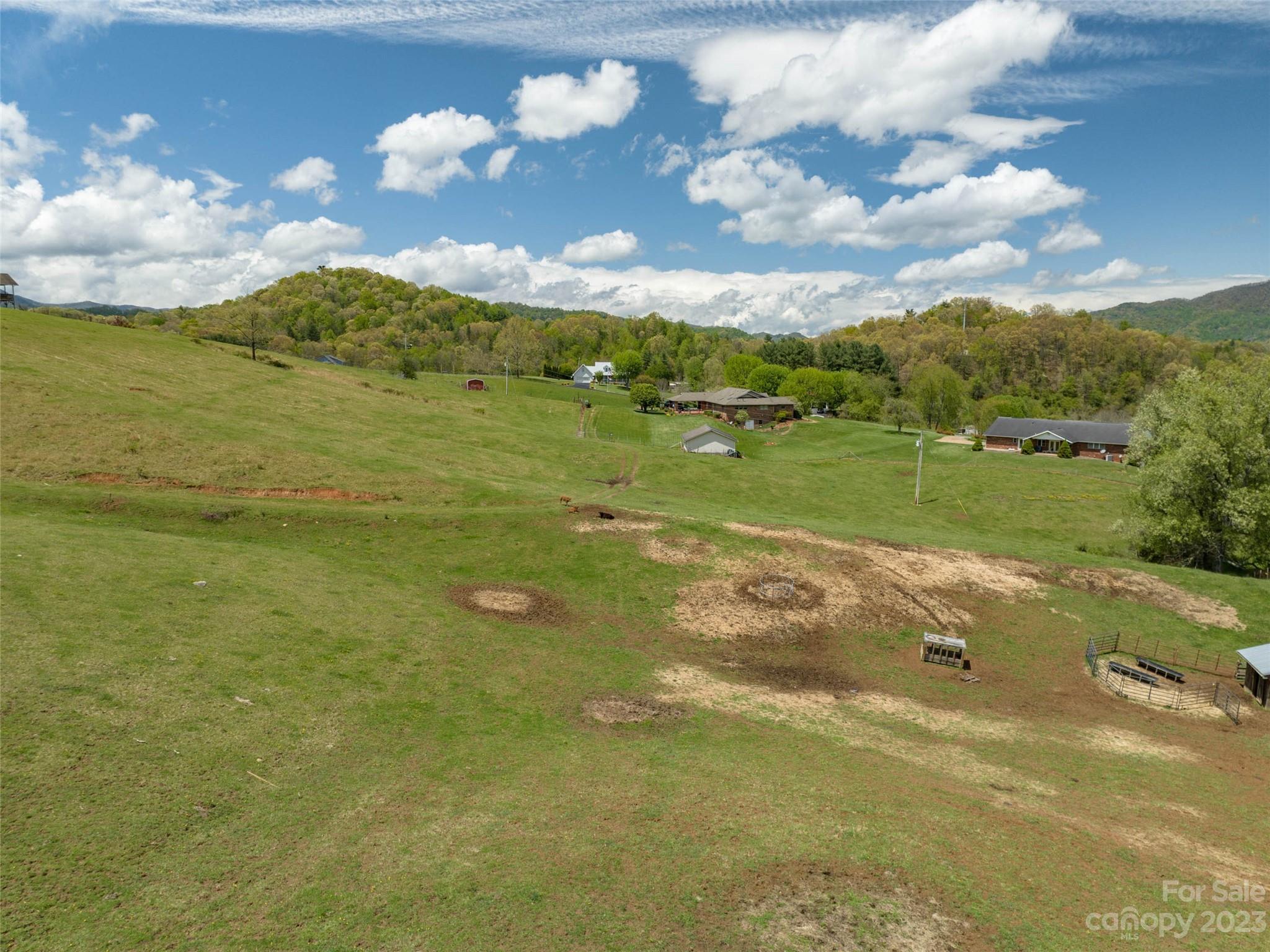 4 Sunny Hill Lane Clyde, NC 28721 - Photo 15 of 27 a view of an ocean from a yard