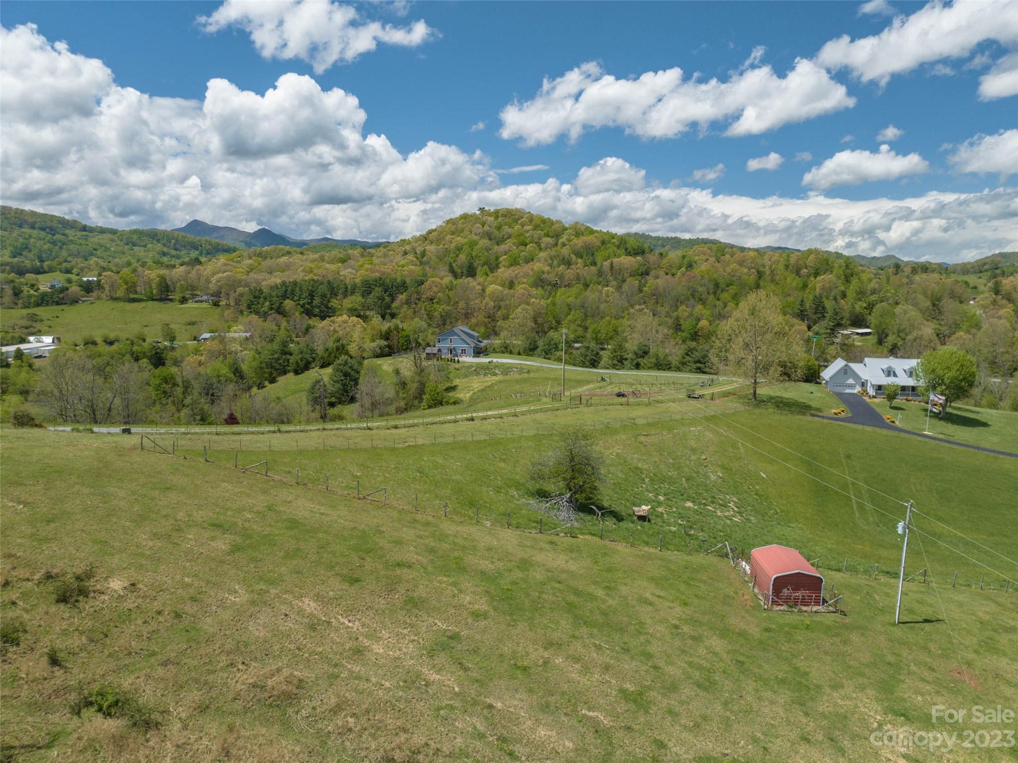 4 Sunny Hill Lane Clyde, NC 28721 - Photo 22 of 27 a view of a field with an trees