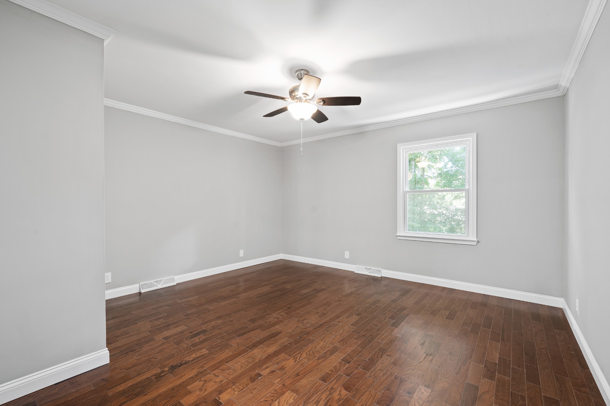 964 Gratton Road Clarksville, TN 37043 - Photo 21 of 43 wooden floor in an empty room with a window