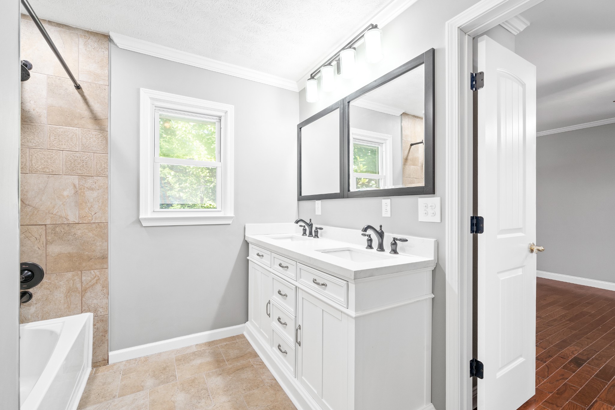 964 Gratton Road Clarksville, TN 37043 - Photo 23 of 43 a bathroom with a sink a vanity and a mirror