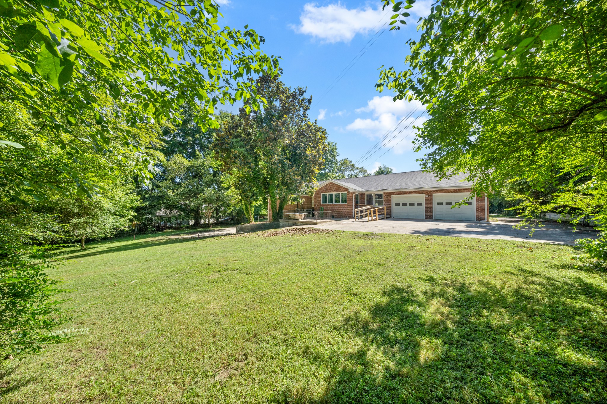 964 Gratton Road Clarksville, TN 37043 - Photo 37 of 43 a view of a house with a yard and sitting area
