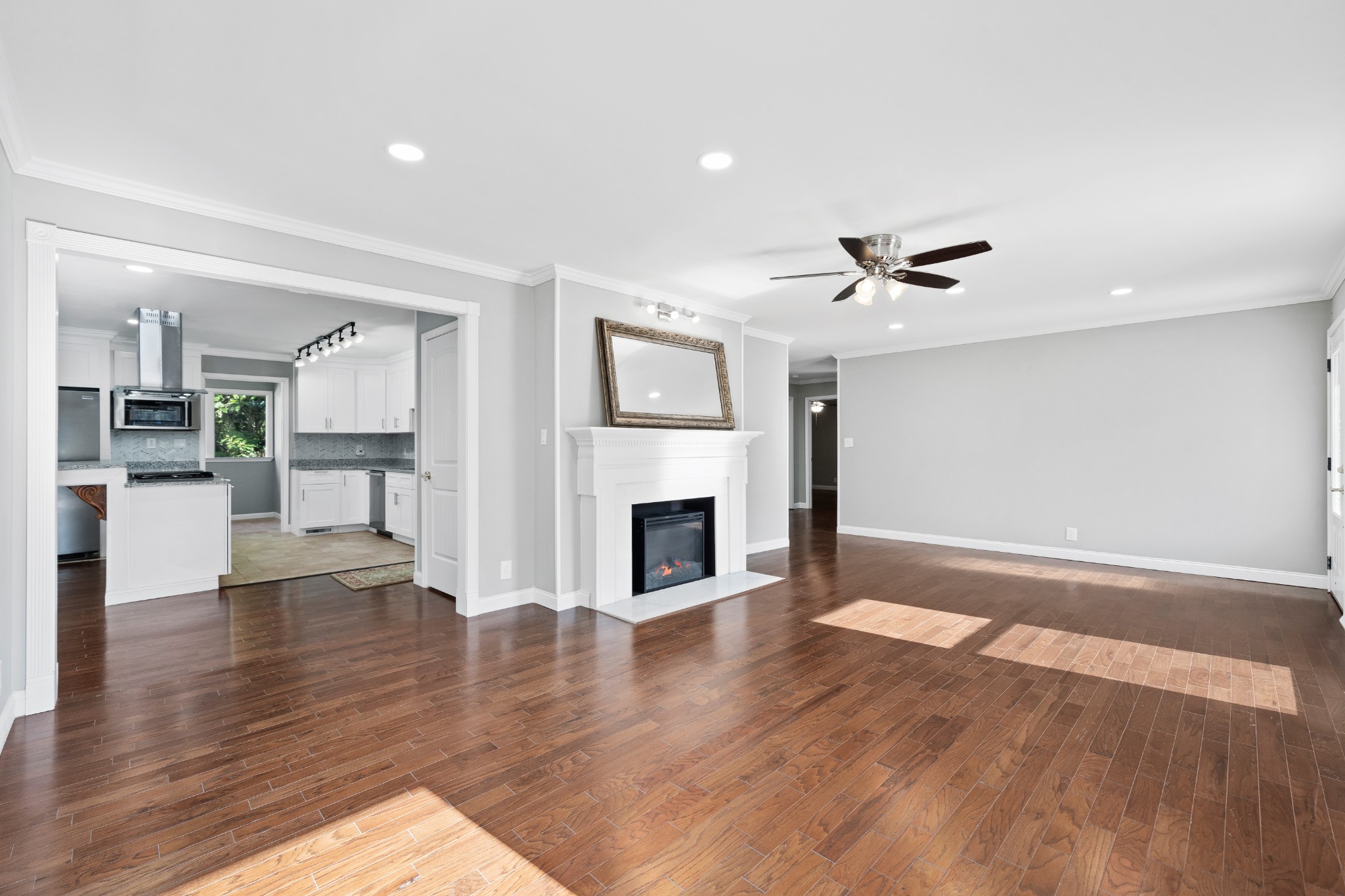 964 Gratton Road Clarksville, TN 37043 - Photo 8 of 43 a view of a livingroom with wooden floor and a kitchen