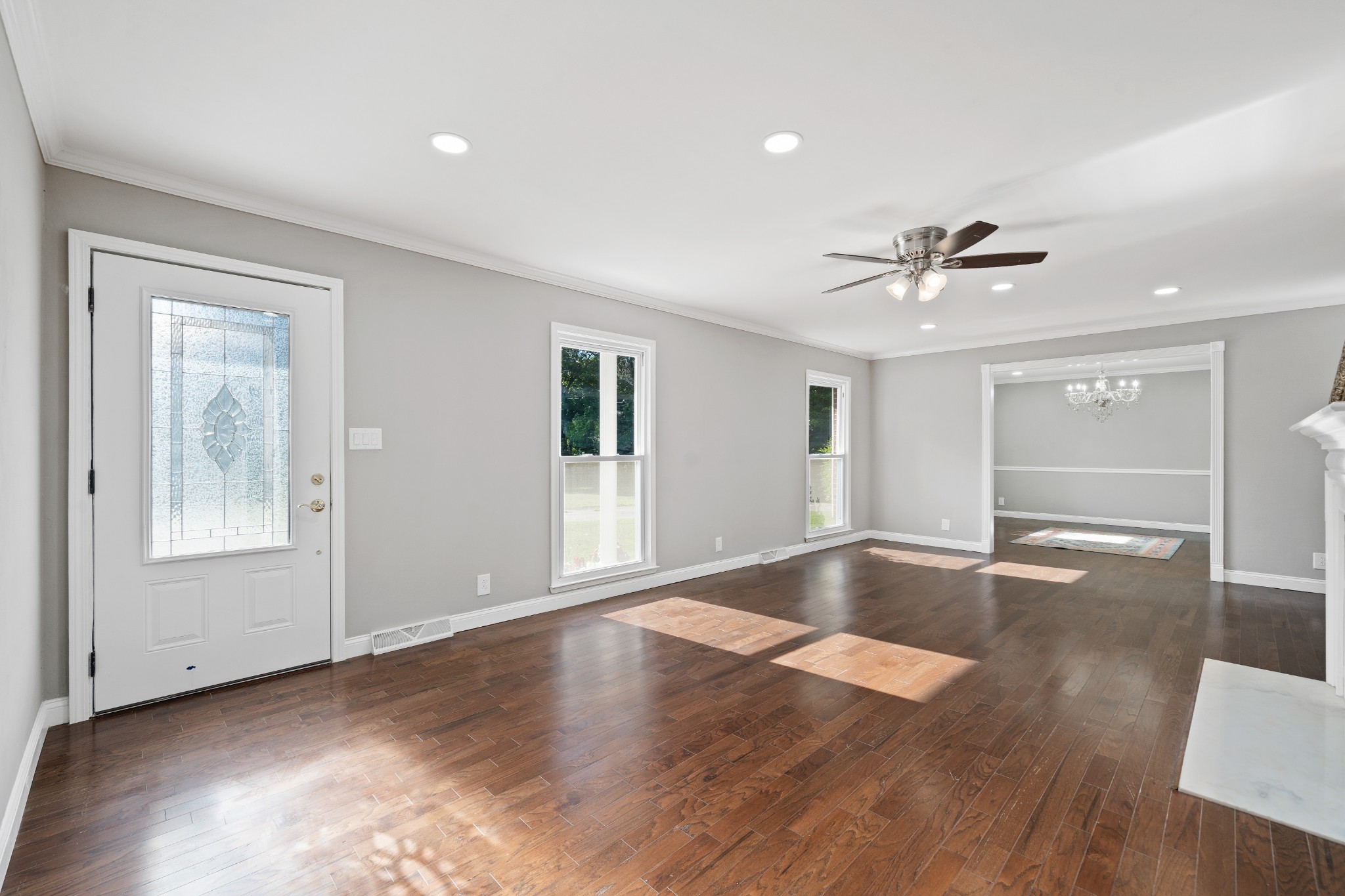 964 Gratton Road Clarksville, TN 37043 - Photo 9 of 43 a view of an empty room with window and wooden floor