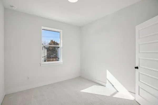 a view of livingroom and hardwood floor