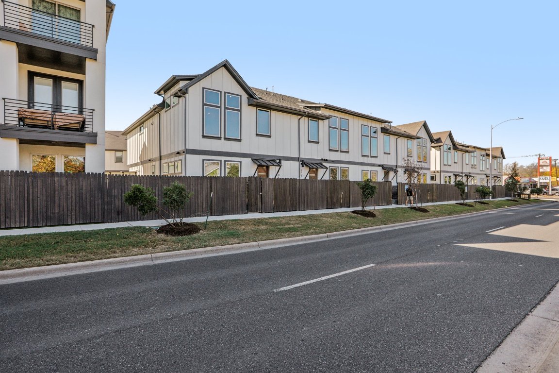 200 West 56th Street, Unit 2104 Austin, TX 78751 - Photo 30 of 36 a view of street with wooden fence
