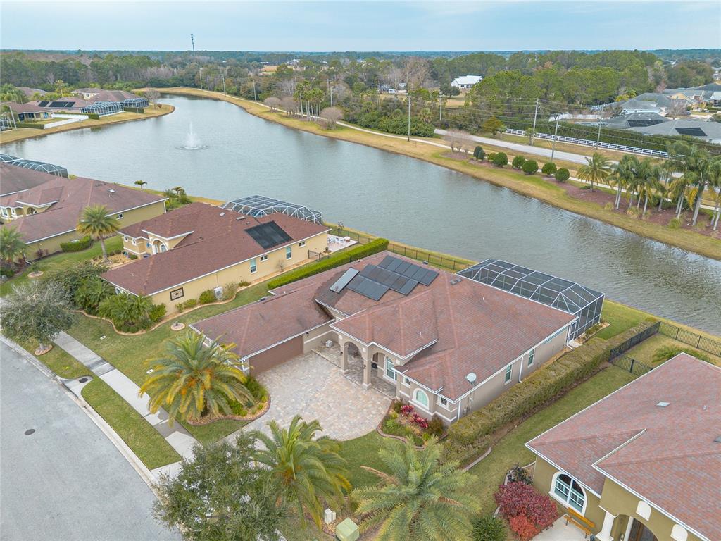 3343 West Locanda Circle New Smyrna Beach, FL 32168 - Photo 12 of 55 an aerial view of a house