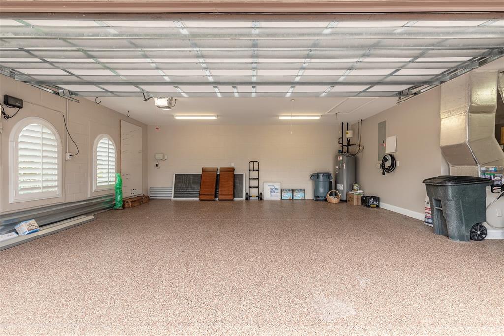 3343 West Locanda Circle New Smyrna Beach, FL 32168 - Photo 16 of 55 a view of a livingroom with furniture and a ceiling fan